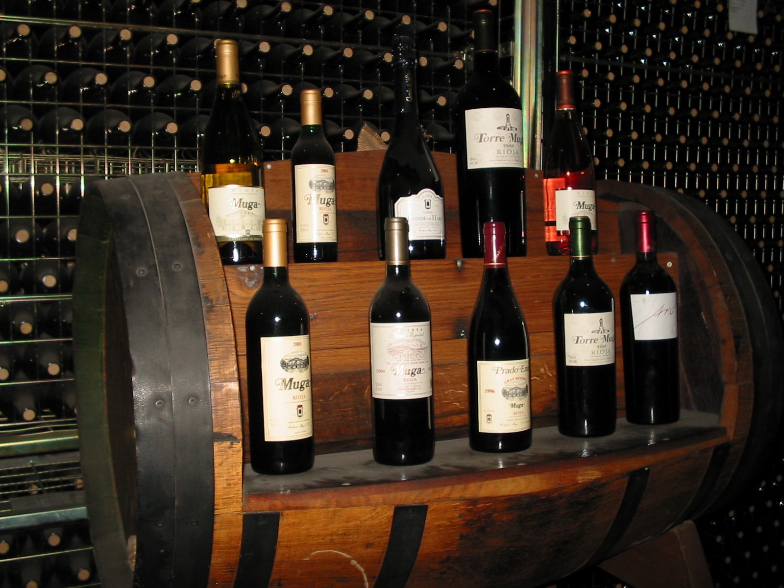 Rows of wine bottles stored in a cellar